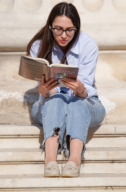 Girl reading a book 1
